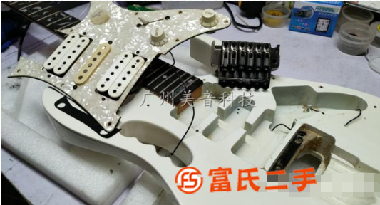 廣州專業(yè)吉他維修，木吉他修理，吉他音箱維修