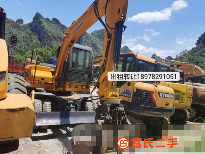 轉(zhuǎn)讓新源抓機抓木機輪挖